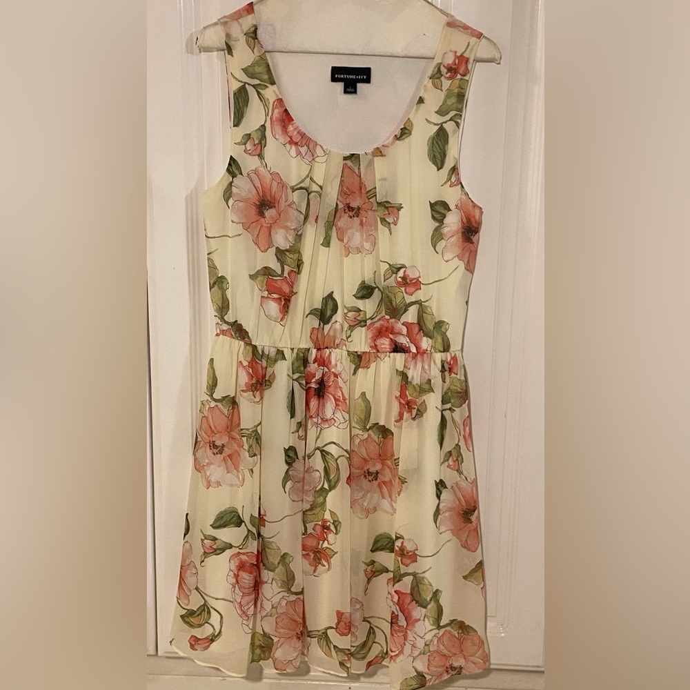 Large sleeveless white floral dress